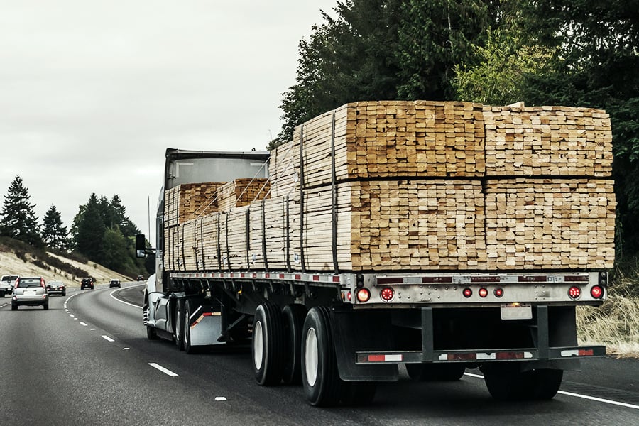 Truck transporting lumber