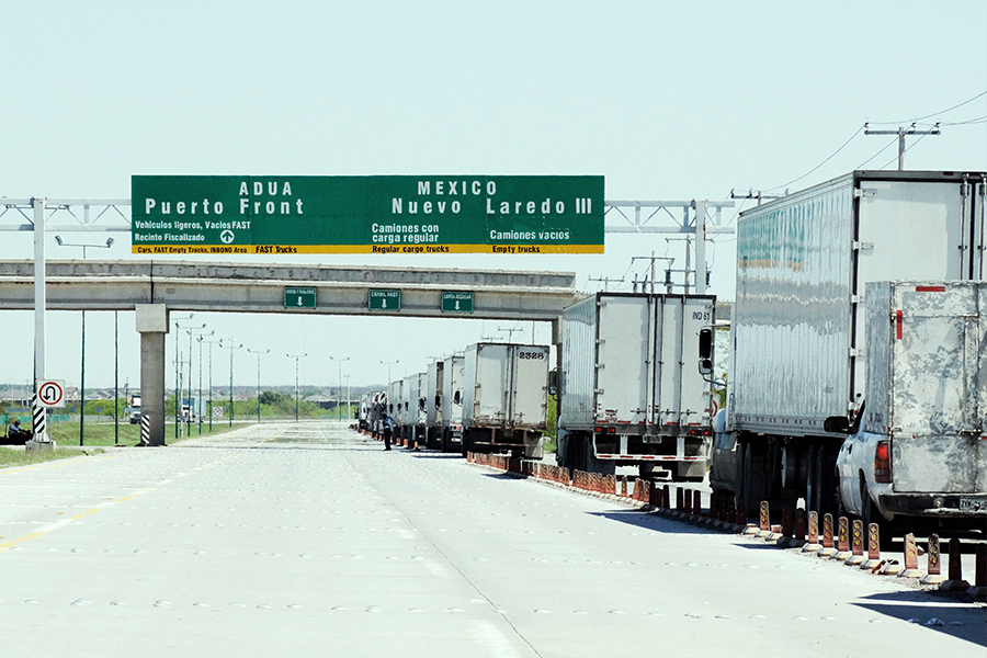 trucks crossing the border from US to Mexico