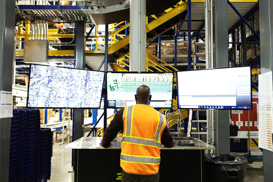 warehouse management system on computer screens