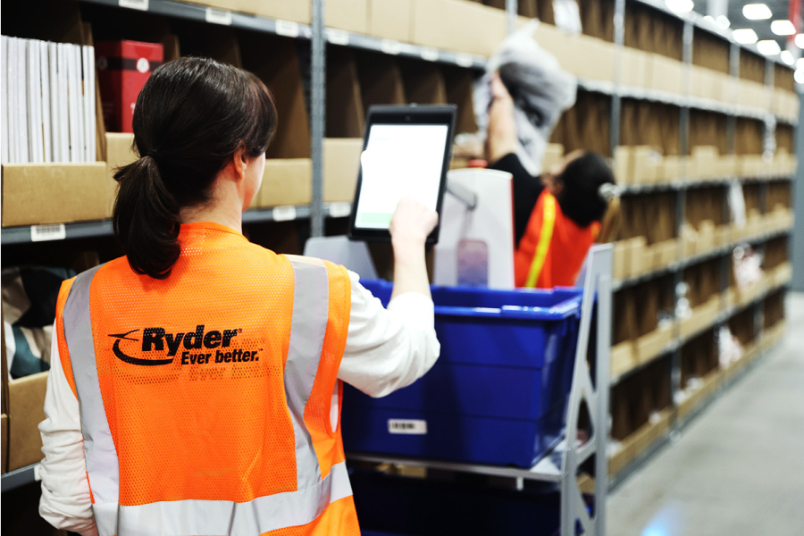 ryder warehouse employee inspecting products