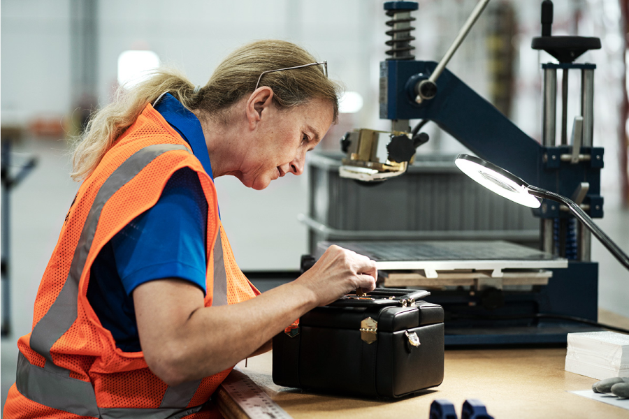 employee working on kitting to combine products