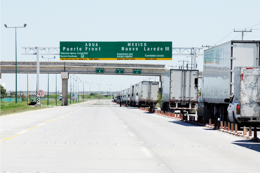 trucks lining up to travel cross border to Mexico